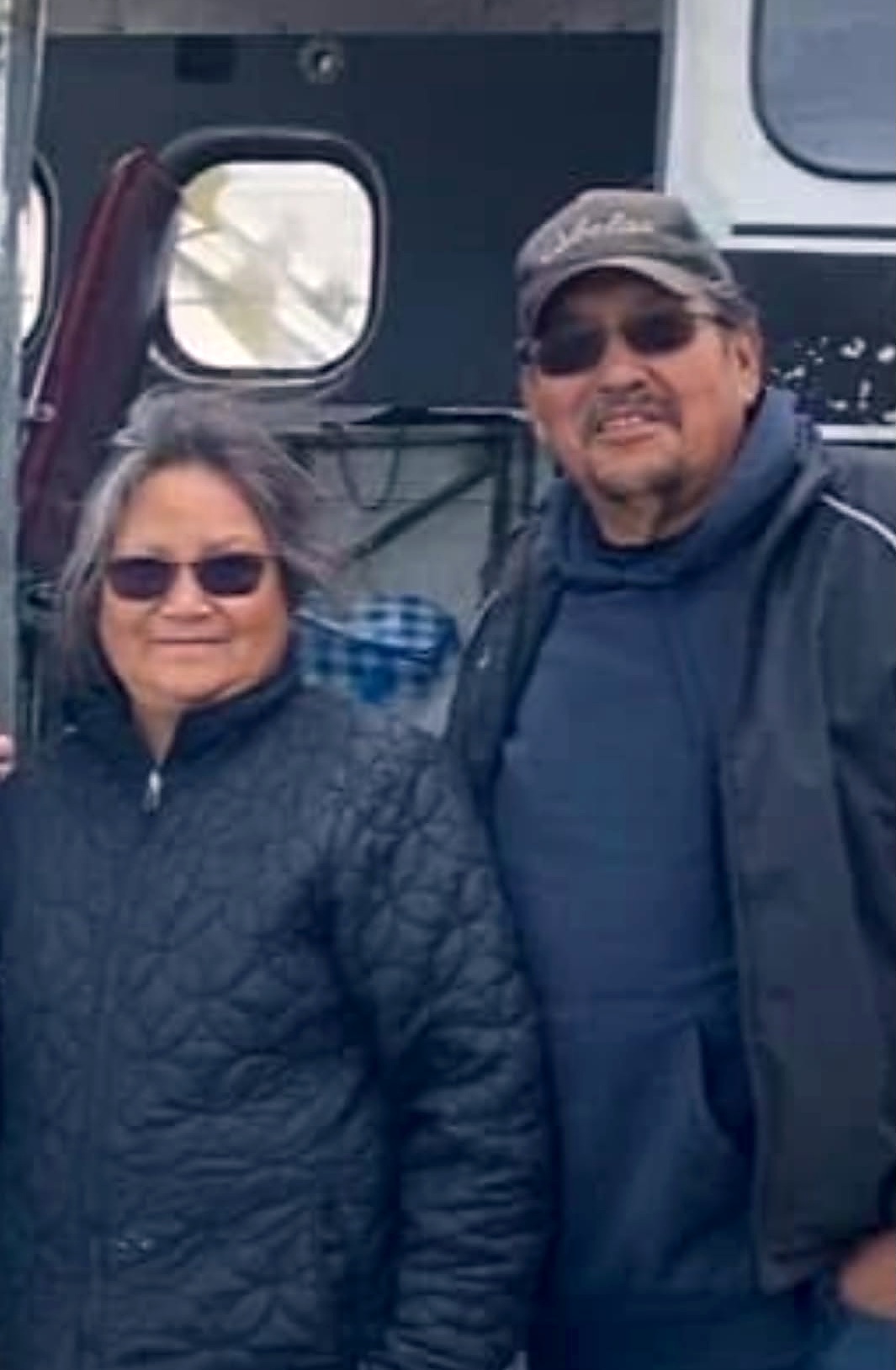 Charles Wesley with his wife Edith beside a floatplane