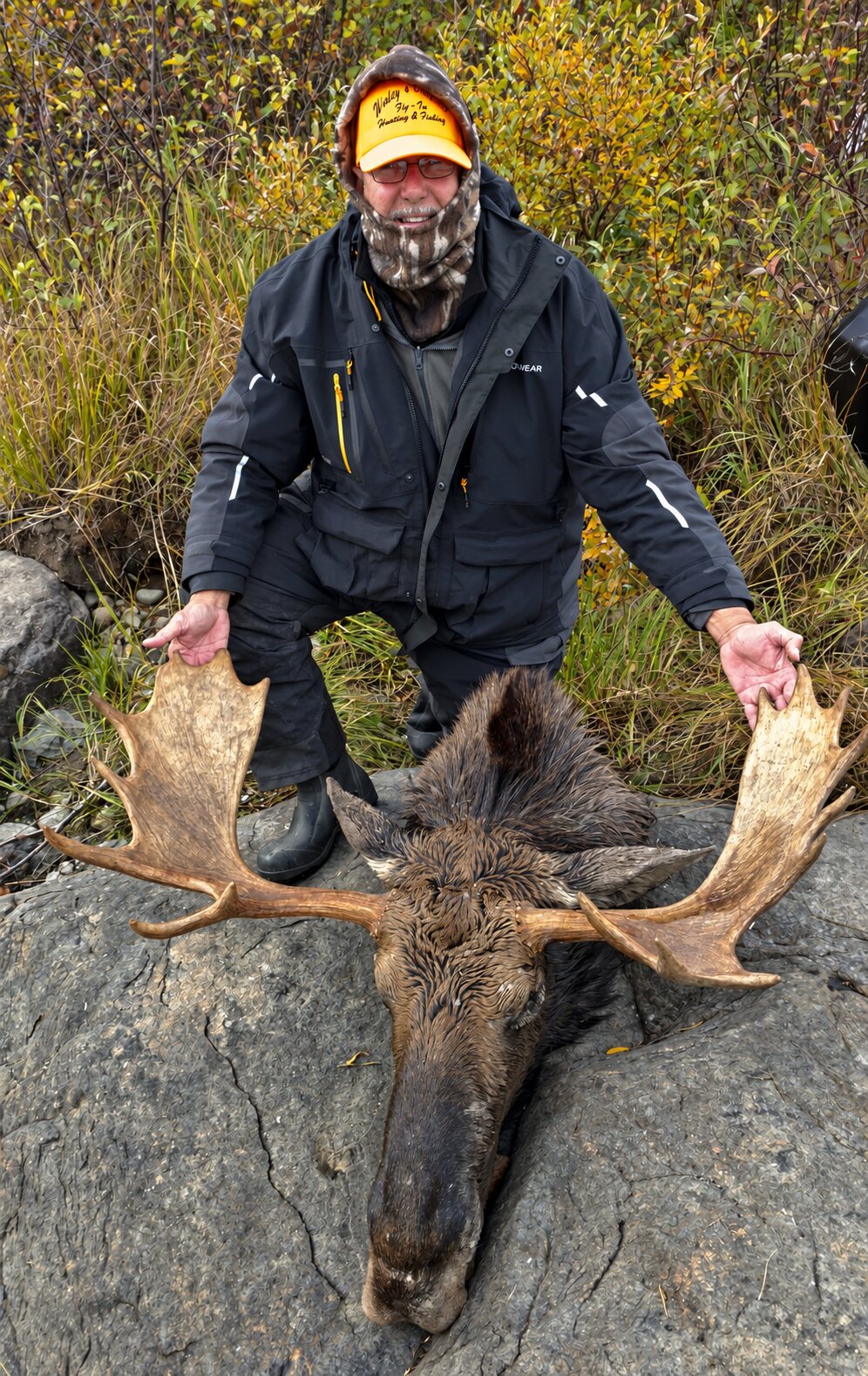 Non-resident hunter with a mature bull moose at a remote Wesley's Outposts cabin location